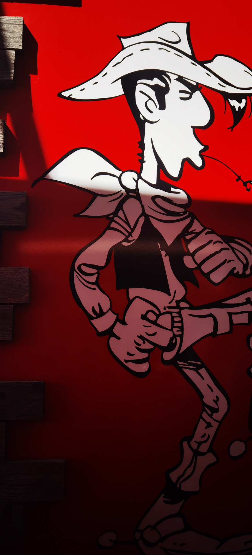 Fresque de Lucky Luke à l'entrée de l'attraction Wanted Dalton au Parc Spirou